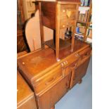 A mid 20thC oak sideboard, with three drawers over two doors, 93cm high, 120cm wide, 49cm deep,