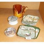 A group of pottery, two Staffordshire Prattware pot lids, one depicting The Village Wedding, another