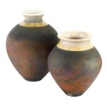 A graduated pair of 20thC Eleanor Newhall Cornish Studio pottery vases, each of tapering circular fo