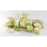 A 20thC Paragon floral decorated Art Deco tea service, decorated with yellow and green flowers, to i