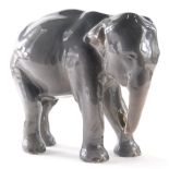 A Copenhagen figure group of a standing elephant, 501, 17cm high.