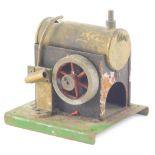 A 20thC Mamod style stationary engine, with cylinder and articulated cog, on a green metal base, unm