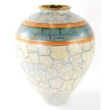 Tony Laverick (b1961). Studio pottery vase decorated in turquoise, signed beneath, 29cm high.