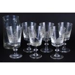 A 20thC drinks set, comprising jug and six glasses, 16cm high, each etched with birds in a country s