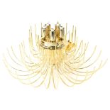 A Murano glass chandelier, composed of multiple clear and gold coloured flecks, with pendant drops a