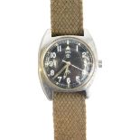 A 1970s CWC military issue wristwatch, with shaped case, luminous hands and markers, chrome case and