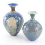 Two Studio pottery vases, by Eleanor Newhall, one with blue speckled glaze and turquoise trumpet ste