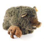 A Modern Steiff warthog and a clockwork bear, with pressed fur and metal body, 6cm high. (2)