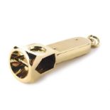 A 9ct gold cigar cutter, with ring top, partially engine turned, 6cm high, 31g, in an associated box