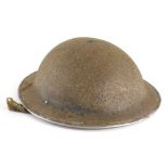 A tin war helmet, of oval form with material strap marked A Henson, with fitted interior, 27cm x 27c