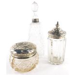 A Victorian silver and cut glass dressing table jar, with pierced silver lid, a further cut glass dr