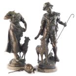 After Mouldet, A pair of French spelter figures, of a shepherd and shepherdess, each stood aside goa