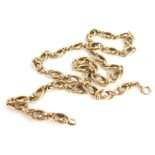 A fancy link chain, marked 9ct to the clasp, 47cm long, 14g.