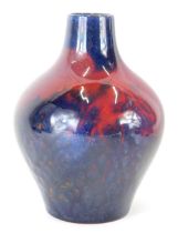 An early 20thC Royal Doulton flambe Sung vase, by Charles Noke, of bellied circular form, signed and