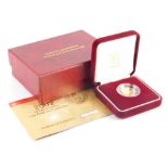 An Elizabeth II gold proof half sovereign, 2002, in outer case with paperwork.