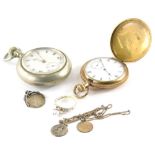 An early 20thC silver plated open faced pocket watch, with fancy etched case, decorated with buildin