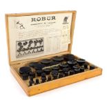 A 20thC Robur Assortment De Tasseaux cased watchmaker's kit, with a selection of case removers, in a