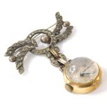 An early 20thC Capital De Luxe brooch fob watch, with an elaborate brooch with plain bin back, in a