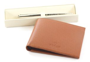 A Rolex ballpoint pen, 13cm long and a Rolex wallet, each cased. (2)