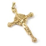 A 9ct gold crucifix pendant, with shaped hook top with detailed decoration, 9cm high, 22g.