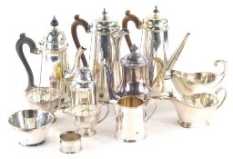 Various silver plated ware, a Queen Anne style coffee pot of tapering circular form, 22cm high, anot