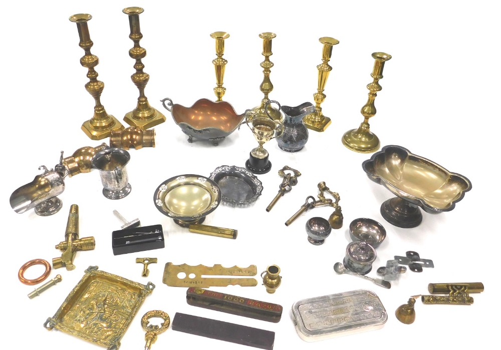 Various metalware, brassware, etc., pair of candlesticks, 27cm high, jugs, silver plated ware, cases