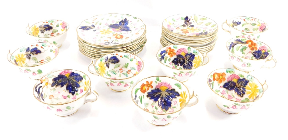 An Allertons late 19thC porcelain tea service, painted with flowers, comprising trio sets, nine cups