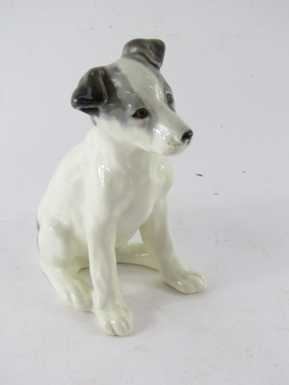 A USSR Konakova porcelain figure of a seated dog, on a white glazed ground with grey spotting, print - Image 3 of 4