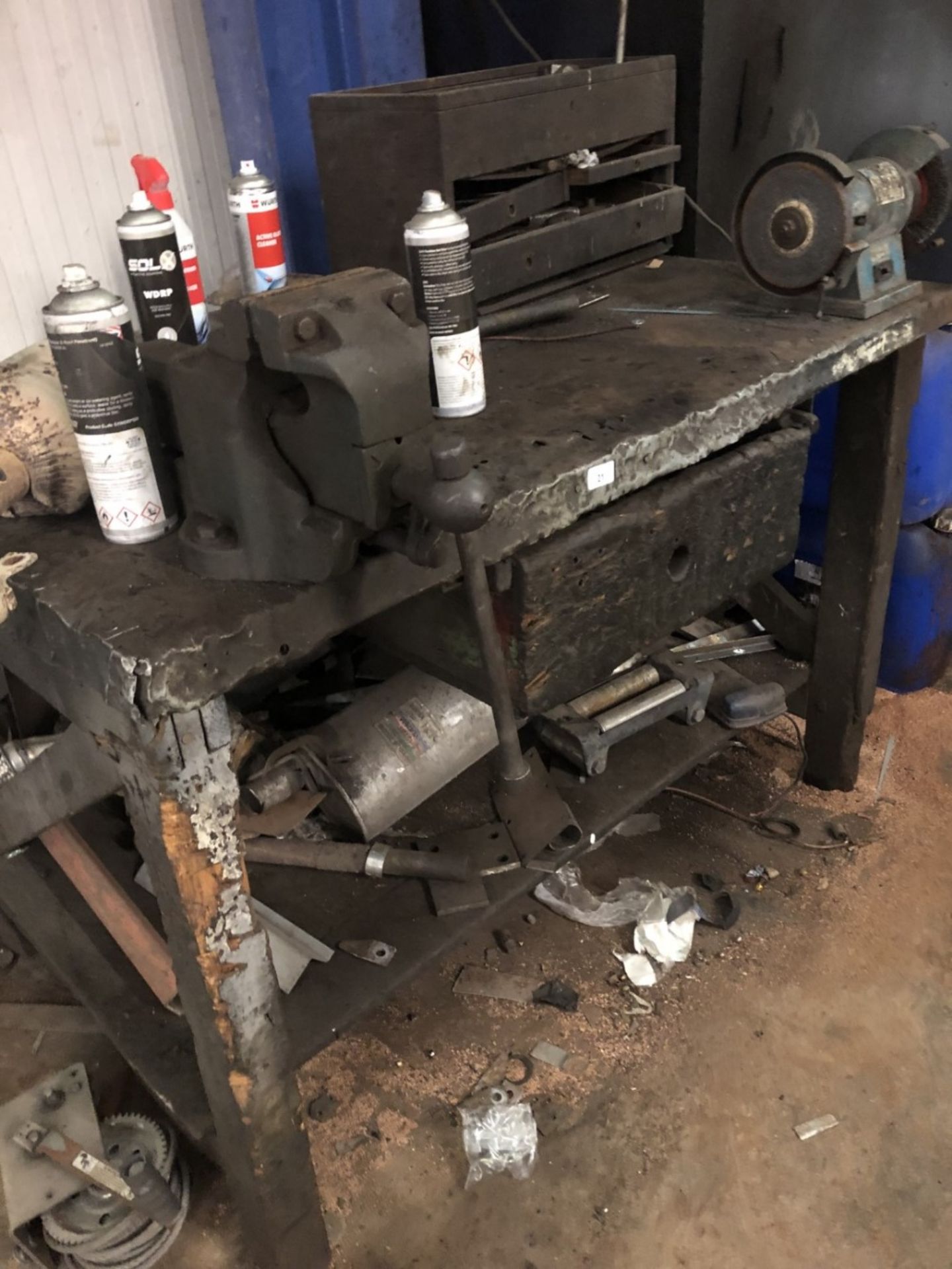 A metal worker's bench, with grinder.