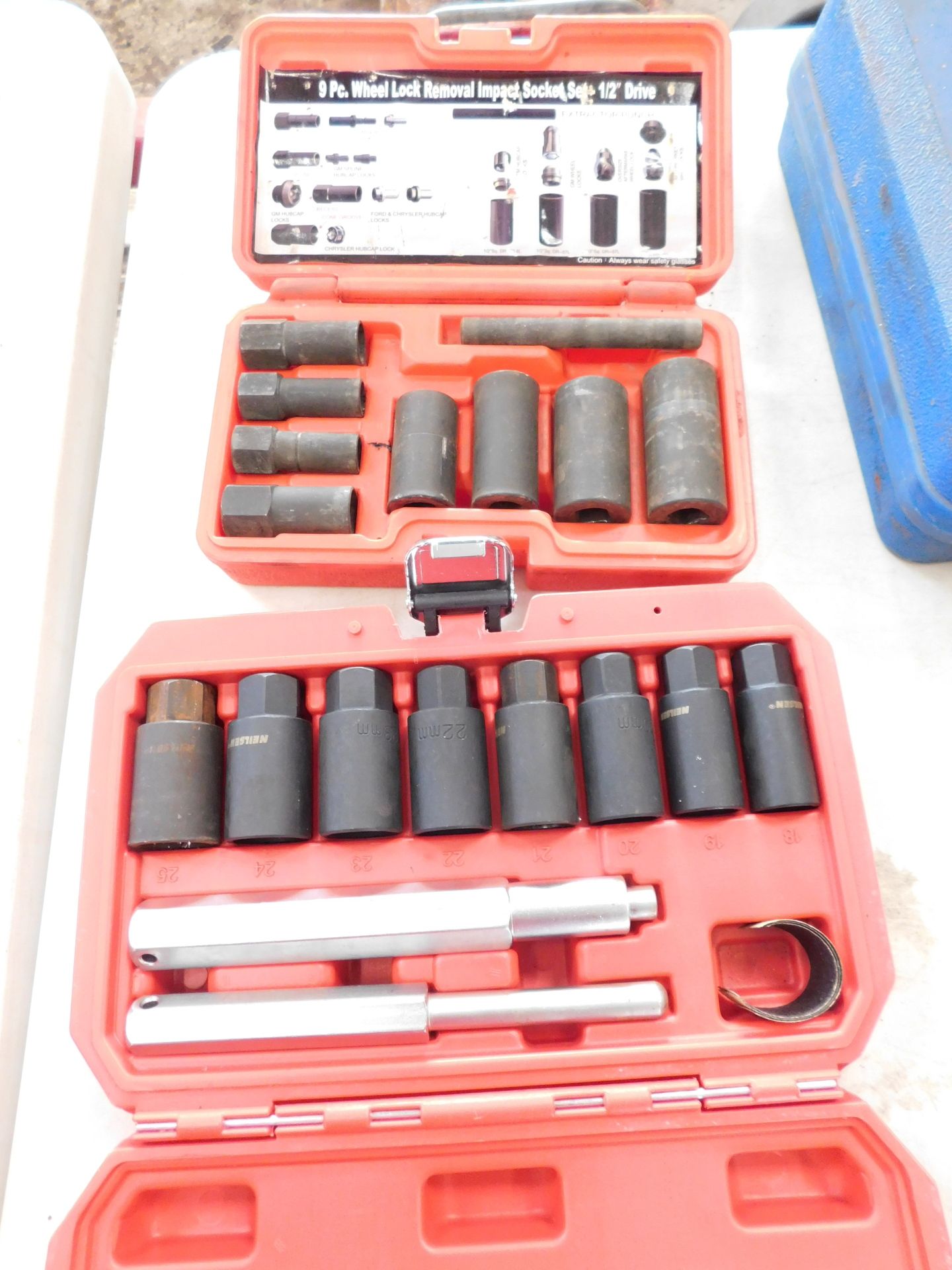 A locking nut remover and Neilsen rim lock dismantling tool set. (2)