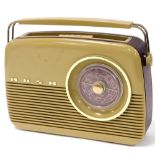 A Bush 'Antique' radio, in mushroom and mauve coloured casing, TR82/97.