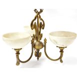An Art Nouveau brass three branch light fitting, with opaque glass up-lighted shades, approx 64cm hi