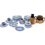 A group of Wedgwood light blue Jasperware trinket dishes, boxes, chamber sticks, and an ashtray, tog