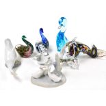 A Maltese Mdina glass figure of a dolphin, two Avondale glass figures of swans, Wedgwood glass duck