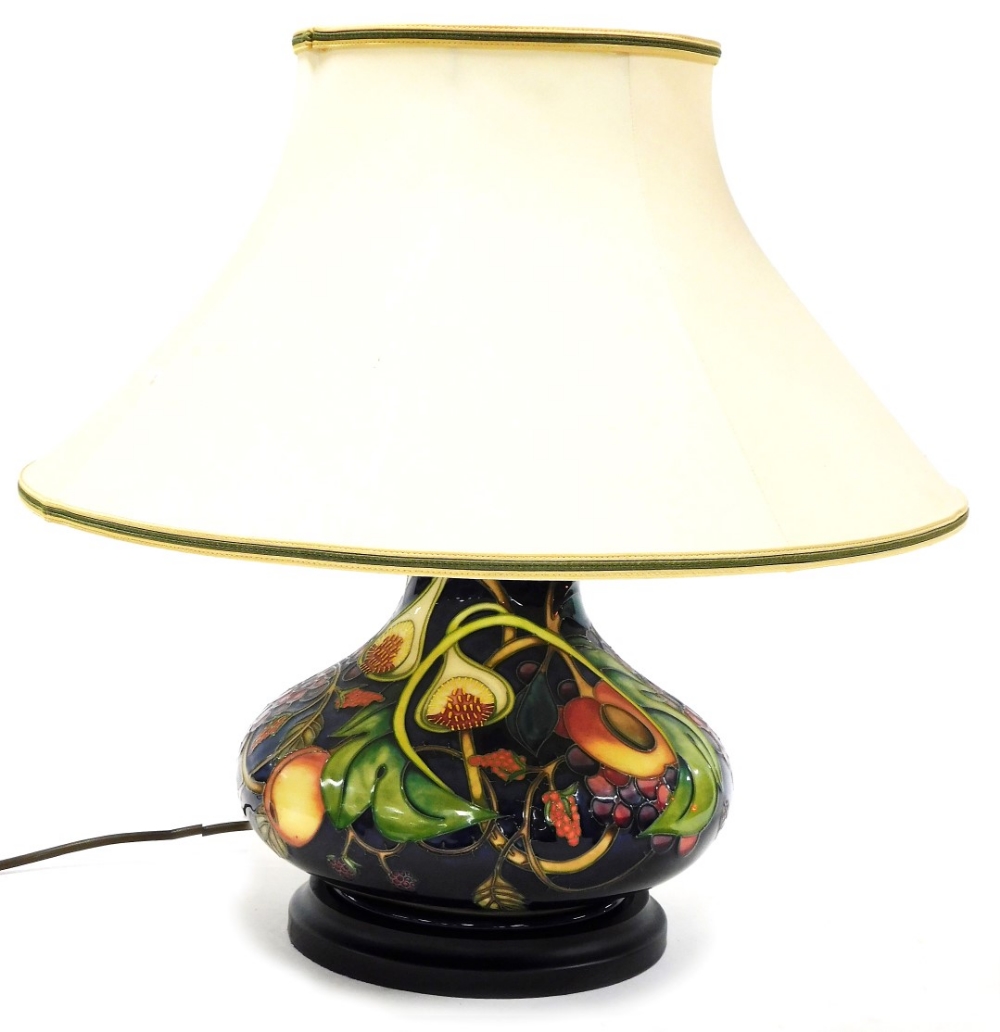 A Moorcroft pottery Queen's Choice table lamp, of compressed out swept form, with shade, 46cm high i