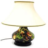 A Moorcroft pottery Queen's Choice table lamp, of compressed out swept form, with shade, 46cm high i