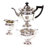 A late 19thC silver plated three piece tea set, comprising teapot, milk jug and sugar bowl, the teap