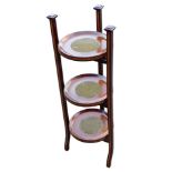 An Edwardian mahogany and satinwood cross banded three tier folding cake stand, 80cm high.