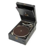 An HMV table top gramophone, in black case, 29cm wide.