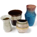 A group of studio pottery vases, to include a blue and purple mottle glaze vase, 26cm high, and a mo