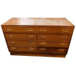 A Danish rosewood chest of drawers, of plain form with eight drawers, each with recessed handles on