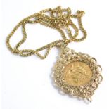 A George V gold half sovereign pendant, 1912, in scroll setting, attached to a slender link chain ma