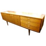 A 1950/60's Indian rosewood sideboard, in Scandinavian style, three doors and three drawers, each wi
