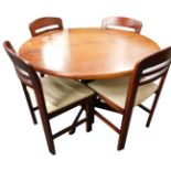 A Danish design rosewood extending dining table, the circular top on a shaped column and base, the t