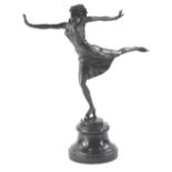 After Antonio Cesaro. An Art Deco style bronze figure of a lady ice skating, on an inverted circular