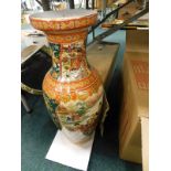 A large Oriental vase.