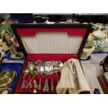 A part canteen of Rogers Bros. cutlery, and a cased Japanese dagger set.