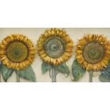 Sara Barass (20thC). Three sunflowers, raised picture, signed, 28cm x 57cm.