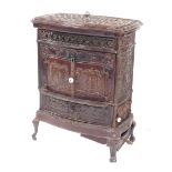 A French cast iron and brown enamel stove, No 258, stamped Le Vosgien, 93cm high, 70cm wide, 44cm de