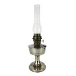 A 1930's Super Aladdin chrome plated oil lamp, with glass funnel on a stepped base, 28cm high.